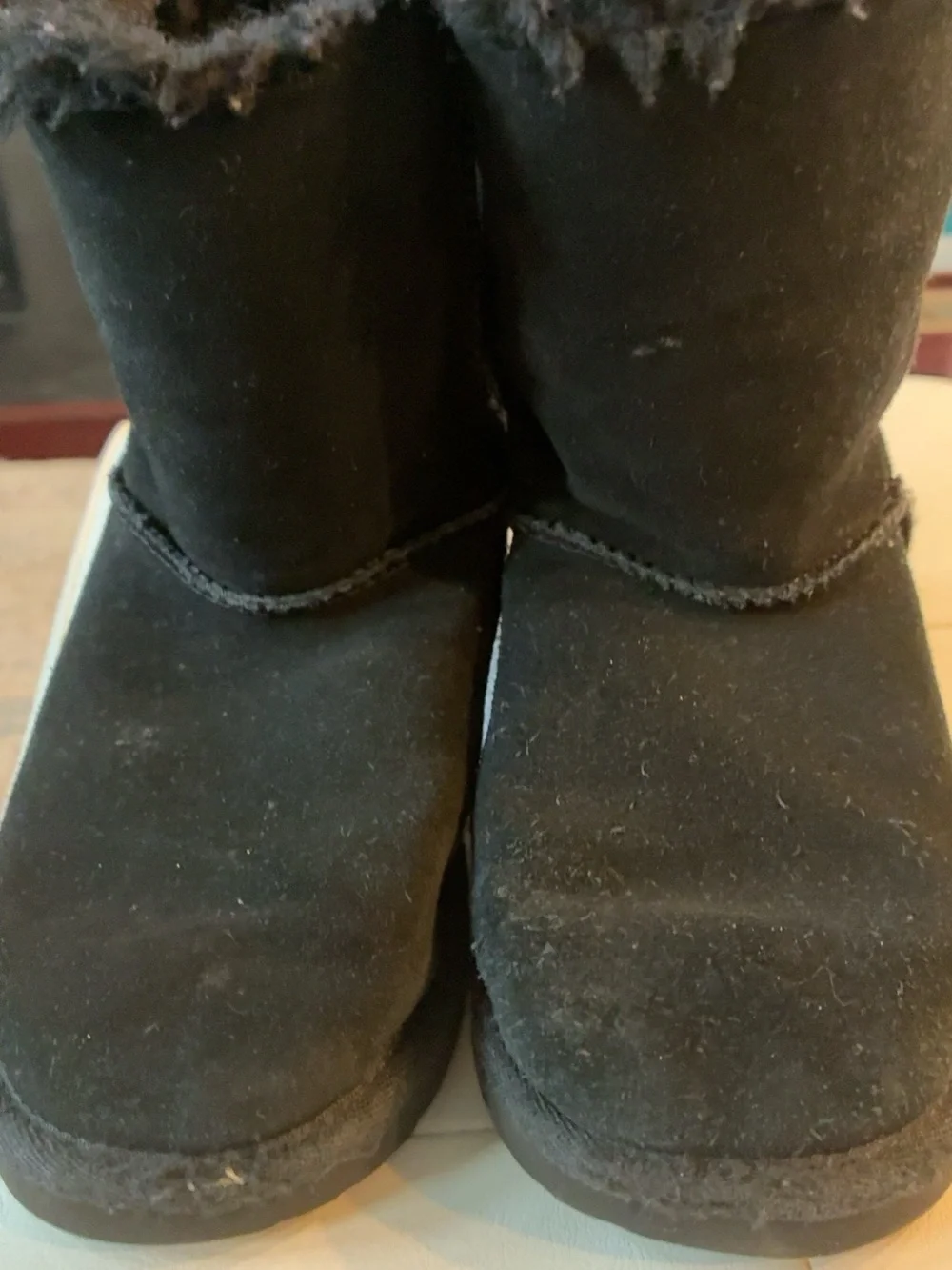 UGG Kids Black Suede Bow-Back Boots with Star-Print Ribbons